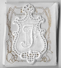 6 Monogrammen F.J.  4,5 x 2,5 cm