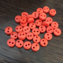Knoopje -  donker oranje  6 mm