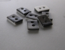 Knoopje - grijs  8,5 x 6 mm