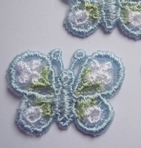 10 Vlinders  (blauw)  22 x 32 mm