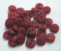 1 miniknoopje  4 mm