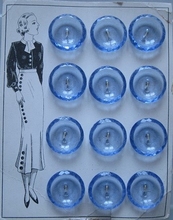 12  Glasknöpfe auf Kart 23 mm