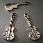 1Tibetan silver gitaar 27 mm